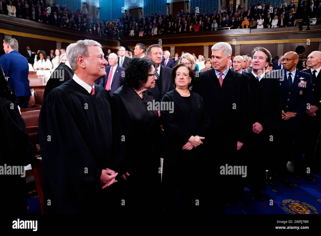 Washington, DC, USA. 07th Mar, 2024. Chief Justice of the United States John G Roberts, Jr. (L), along with Associate Justices (L-R) Sonia Sotomayor, Elena Kagan, Neil Gorsuch, and Brett Kavanaugh stand in the House of Representatives ahead of US President Joe Bidens third State of the Union address to a joint session of Congress in the US Capitol in Washington, DC, USA, 07 March 2024. Credit: Shawn Thew/Pool via CN/dpa/Alamy Live News Stock Photo