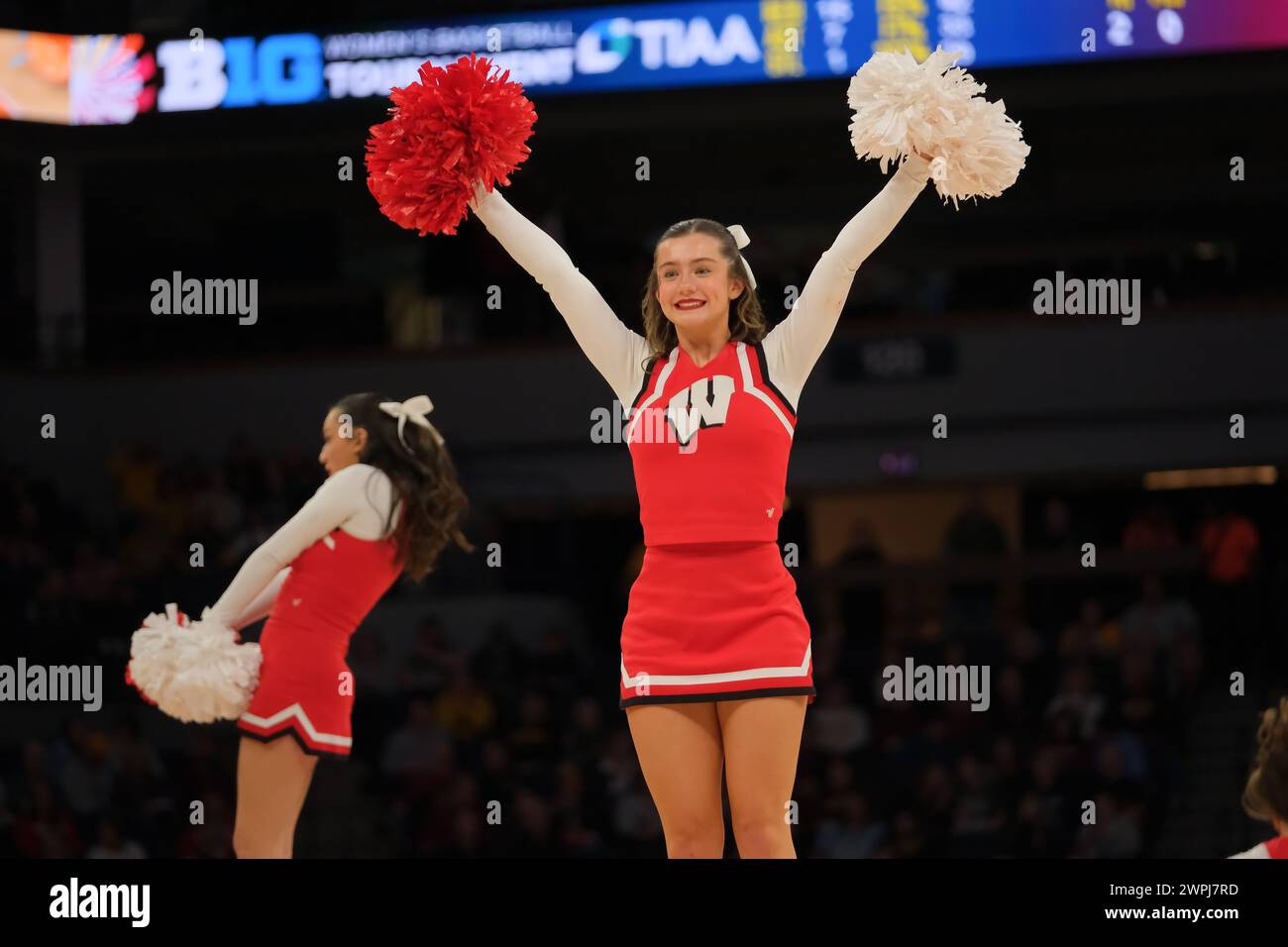 Minneapolis, Minnesota, USA. 7th Mar, 2024. A Wisconsin Badgers cheerleader during a game between Wisconsin and Penn State at the 2024 TIAA Big10 Women's Basketball Tournament at Target Center on March 7th, 2024. Penn State won 80-56. (Credit Image: © Steven Garcia/ZUMA Press Wire) EDITORIAL USAGE ONLY! Not for Commercial USAGE! Stock Photo
