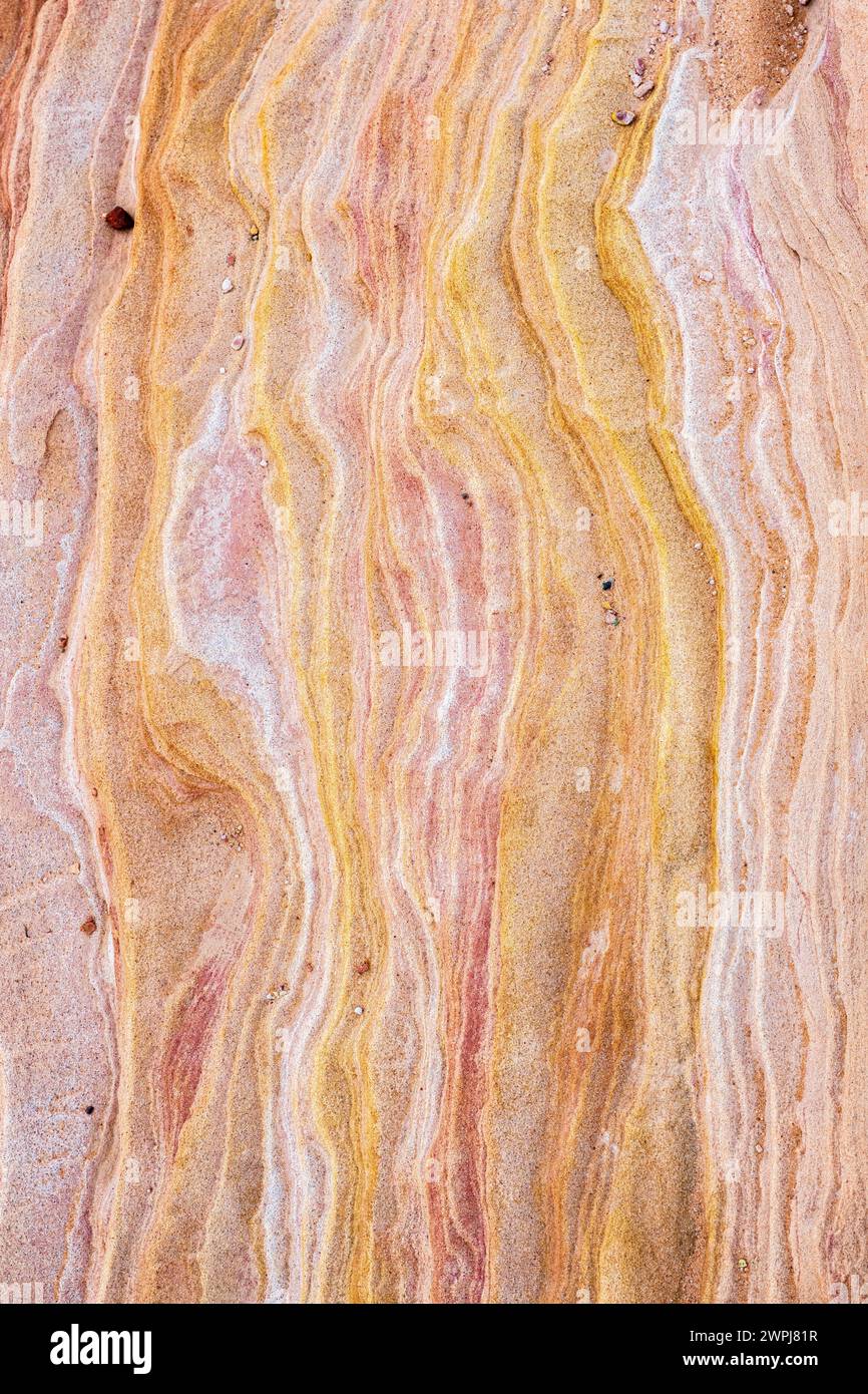 Valley of Fire State Park Nevada Fire Wave hike on red sandstone with iron oxide - hiking the Mojave desert near Las Vegas Stock Photo