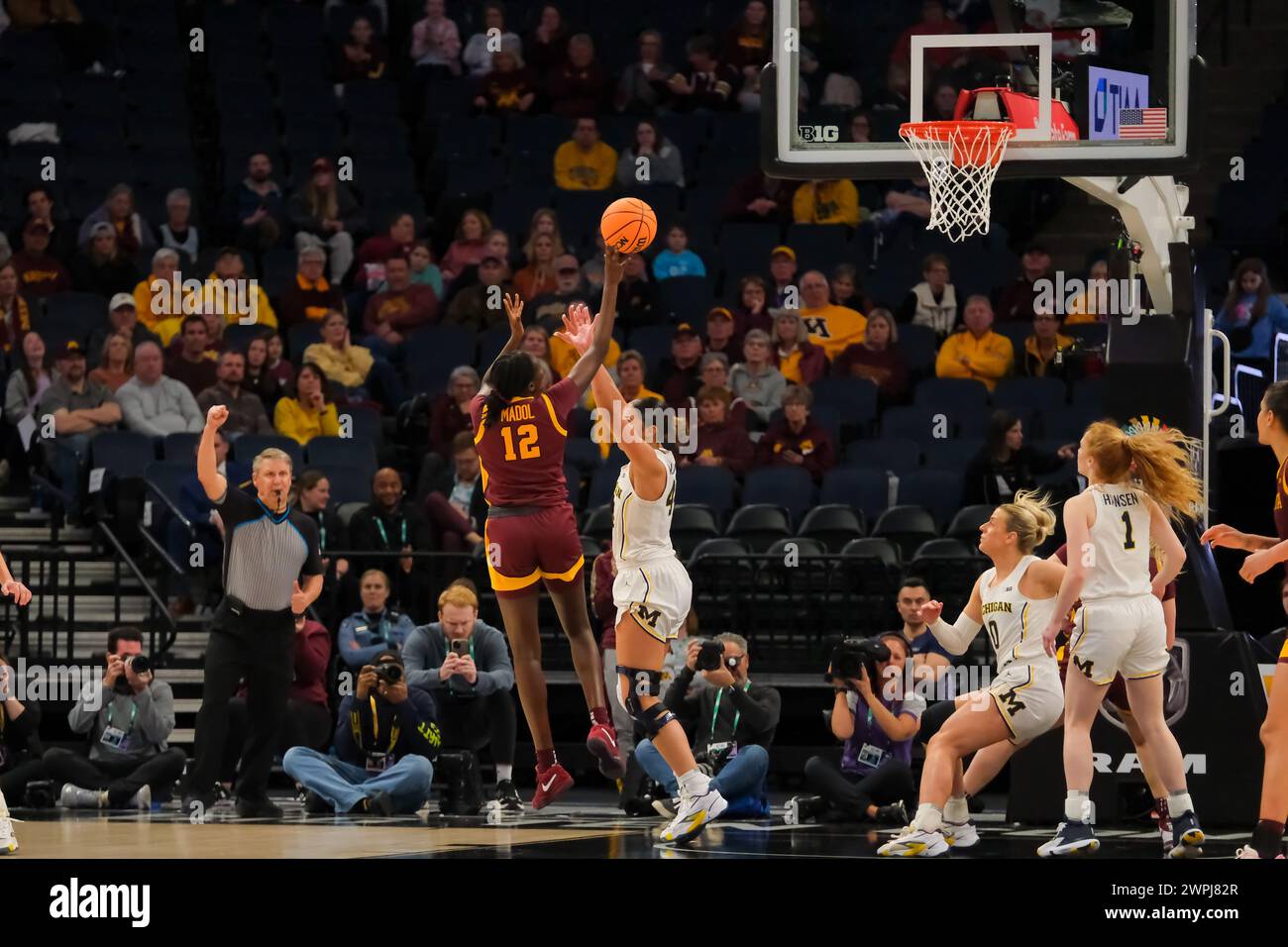 Minneapolis, Minnesota, USA. 7th Mar, 2024. Minnesota Golden Gophers guard AJOK MADOL (12) shoots for 2 during a game between Michigan and Minnesota at the 2024 TIAA Big10 Women's Basketball Tournament at Target Center on March 7th, 2024. Michigan won 76-57. (Credit Image: © Steven Garcia/ZUMA Press Wire) EDITORIAL USAGE ONLY! Not for Commercial USAGE! Stock Photo
