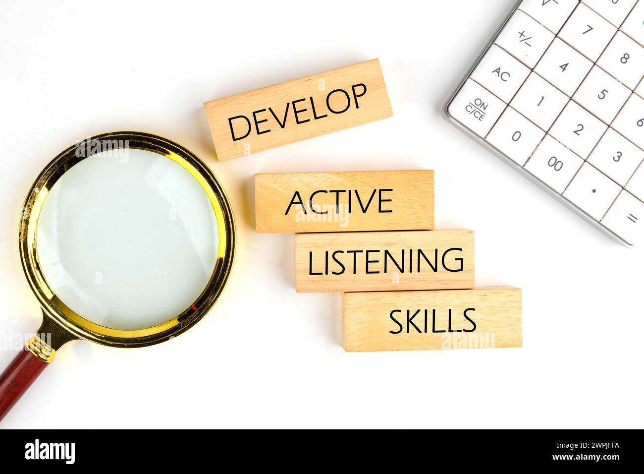 Concept word Develop active listening skills on wooden blocks on a ...