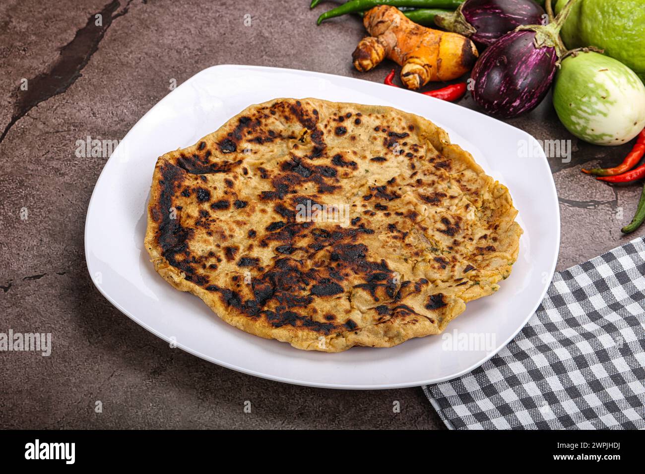 Indian cuisine stuffed Aloo paratha bread with potato Stock Photo Alamy