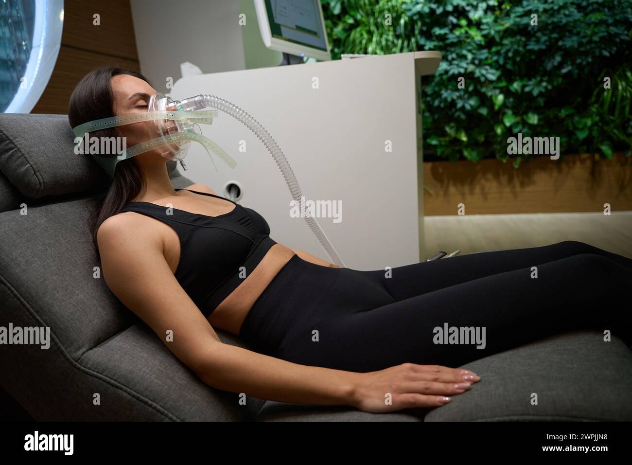 Female lying on couch, recovery and treatment procedure Stock Photo Alamy