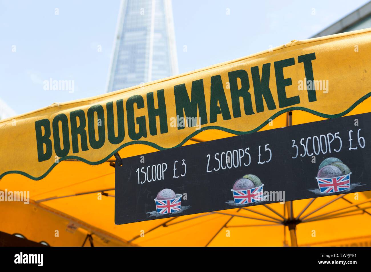 UK, London, Borough market and the Shard with signage for ice creams. Stock Photo