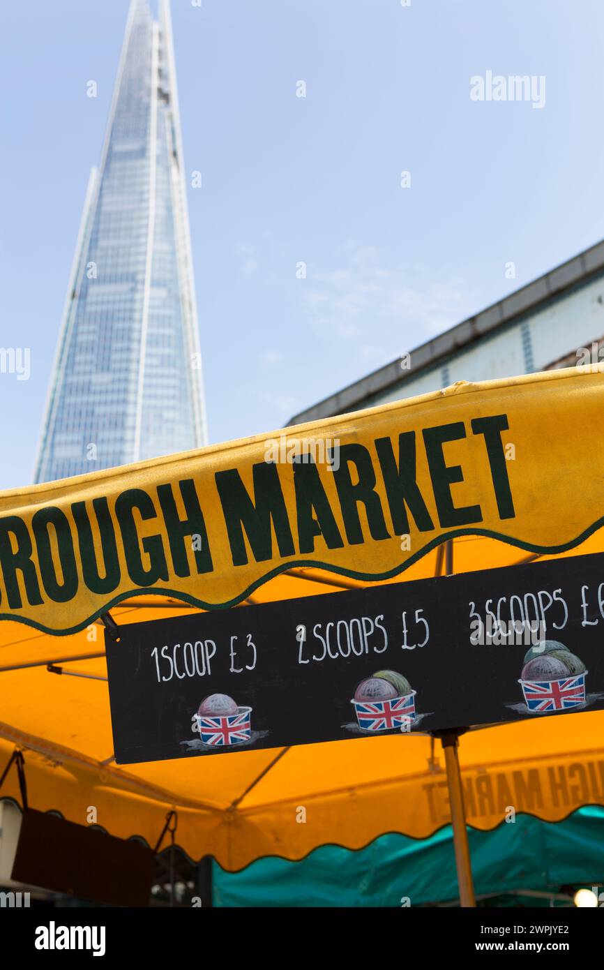 UK, London, Borough market and the Shard with signage for ice creams. Stock Photo