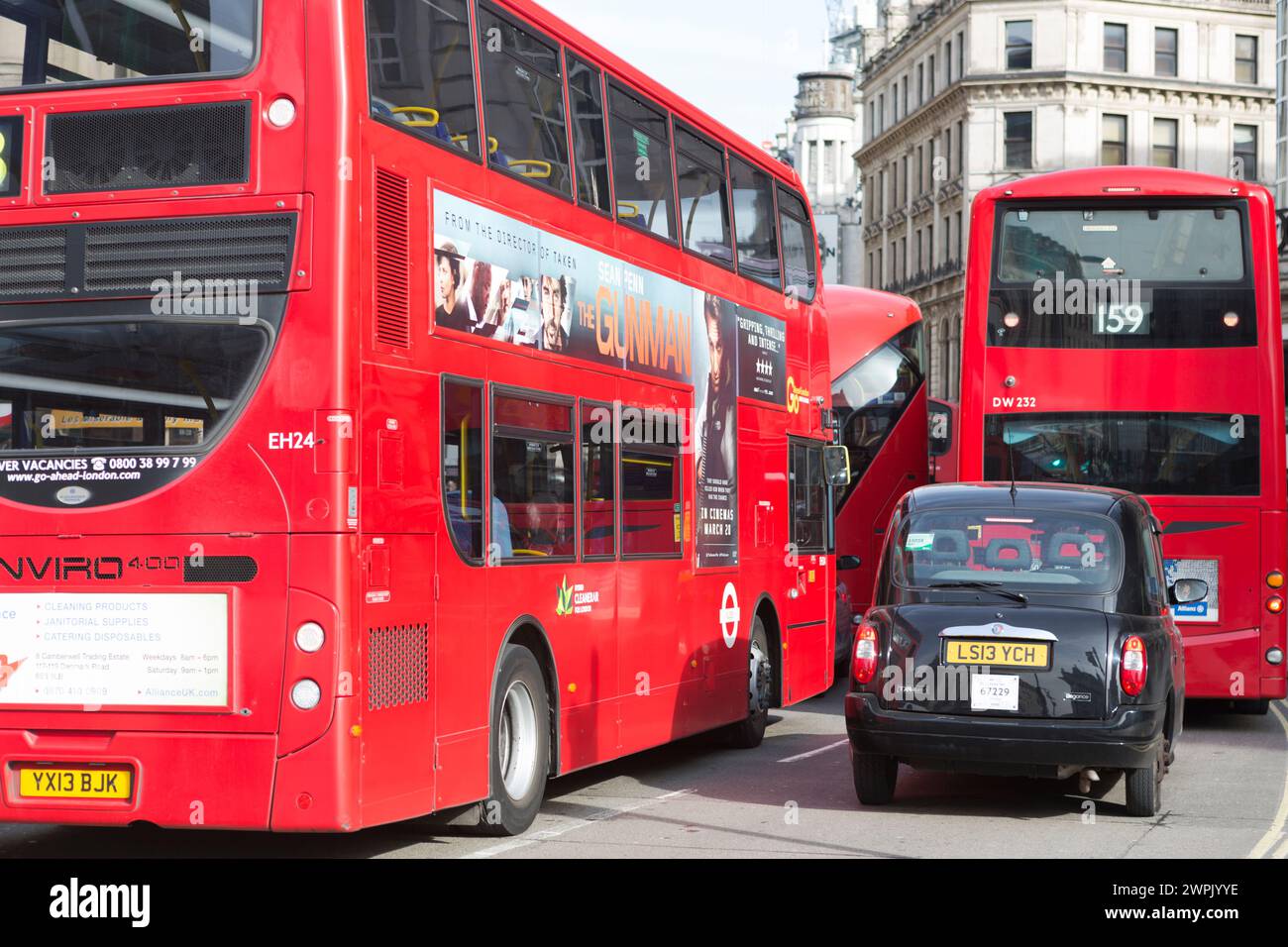 UK, London, red London Busses and black taxi. Stock Photo
