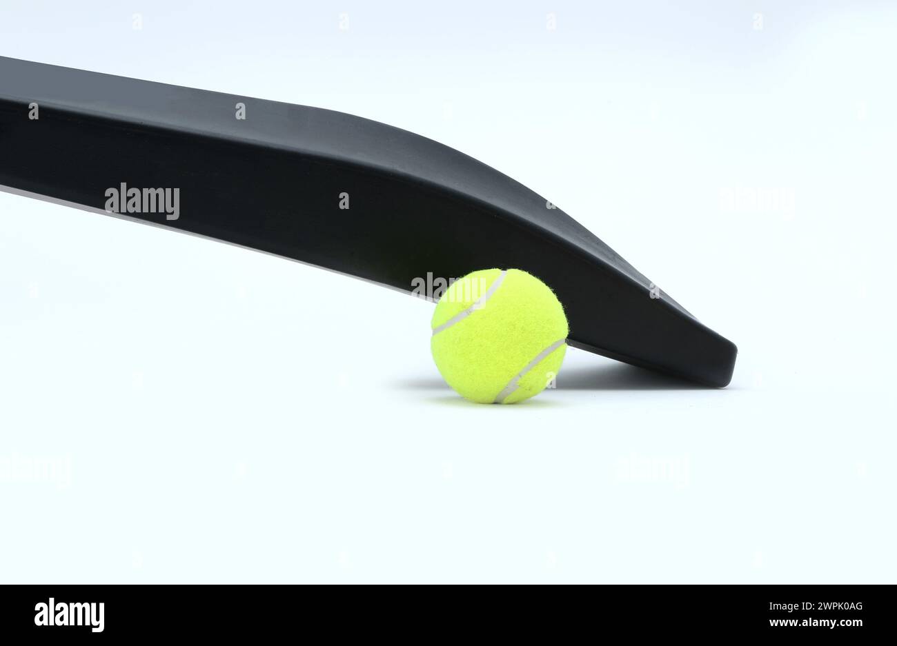 wind ball with black pvc cricket bat isolated Stock Photo - Alamy - Cricket Bat Wind Chimes