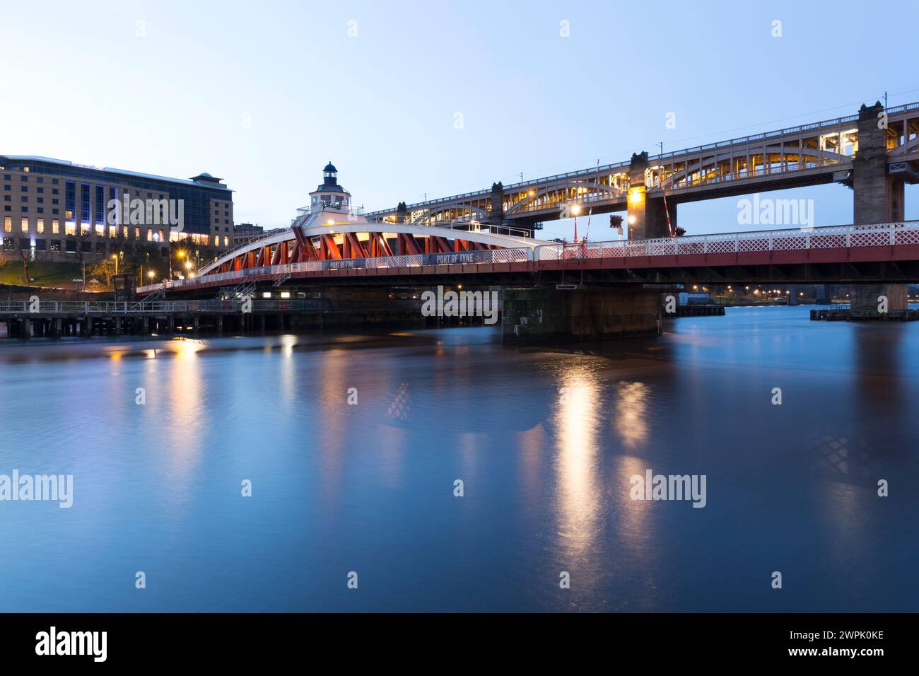 UK, Newcastle upon Tyne, the red Swing Bridge  and High Level Bridge over the river Tyne. Stock Photo