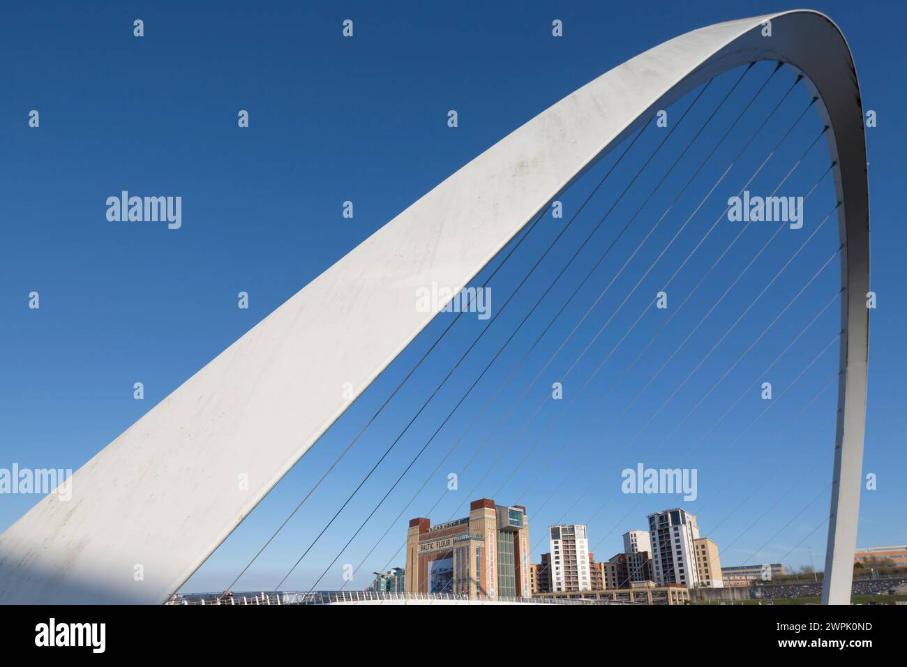 UK, Newcastle, the Gateshead Millennium bridge spanning the river Tyne. Stock Photo