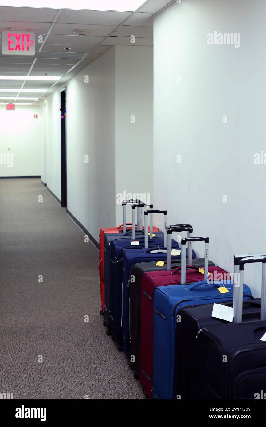 many suitcases lined up Stock Photo