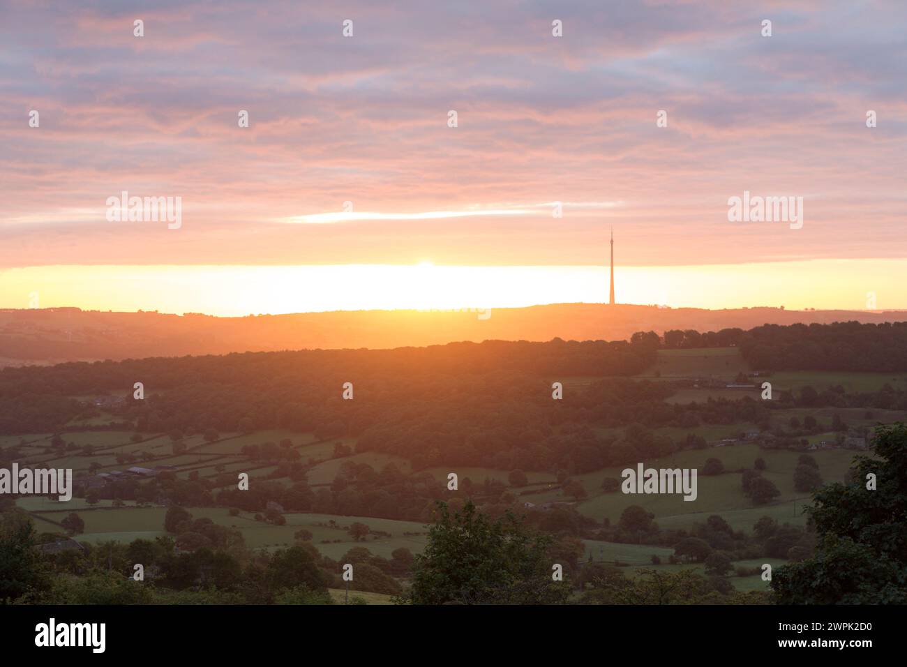 UK, West Yorkshire, sunrise over Emley Moor from Castle Hill. Stock Photo