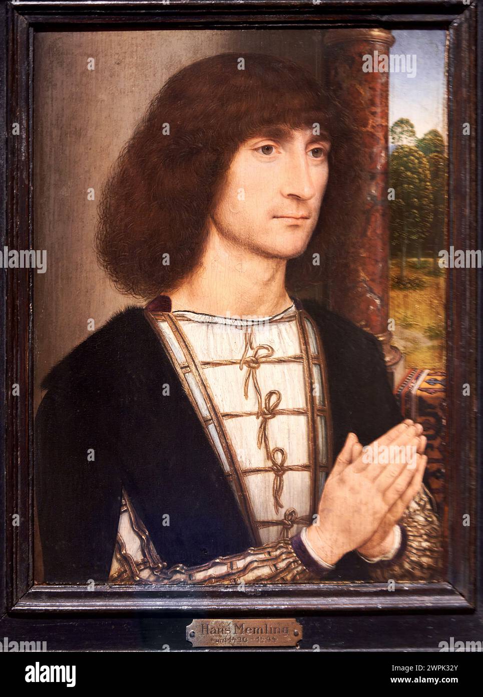 Hans Memling (Seligenstadt, hacia 1433-Brujas, 1494), Portrait of a Young Man praying (recto), Hacia 1485 Stock Photo