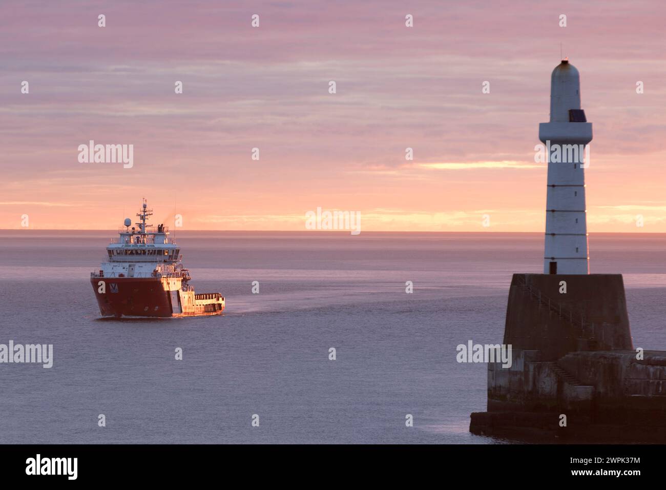 UK, Scotland, entrance to Aberdeen harbour at Sunrise. Stock Photo