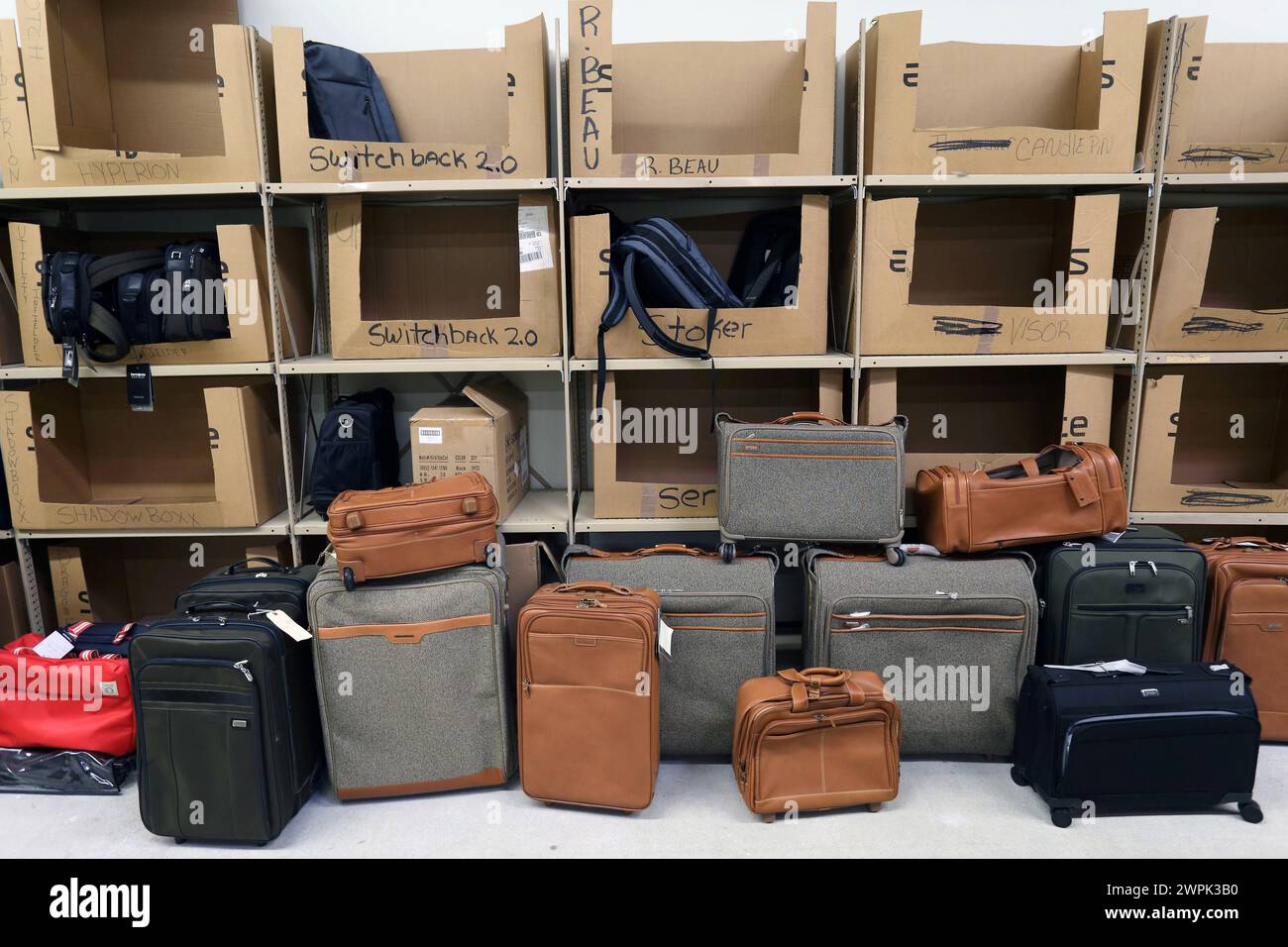 Various Hartmann Luggage in storage room Stock Photo