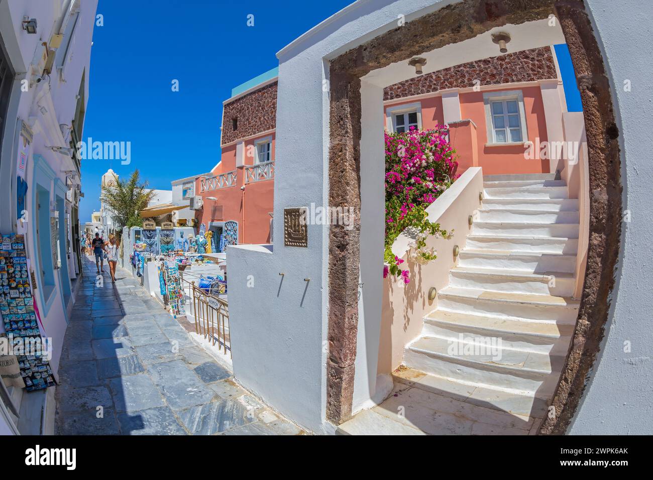 OIA, SANTORINI, GREECE - JUNE 21, 2021: Shop with typical souvenirs from Greece and Santorini island, located on Main Street Nik. Nomikou. Stock Photo