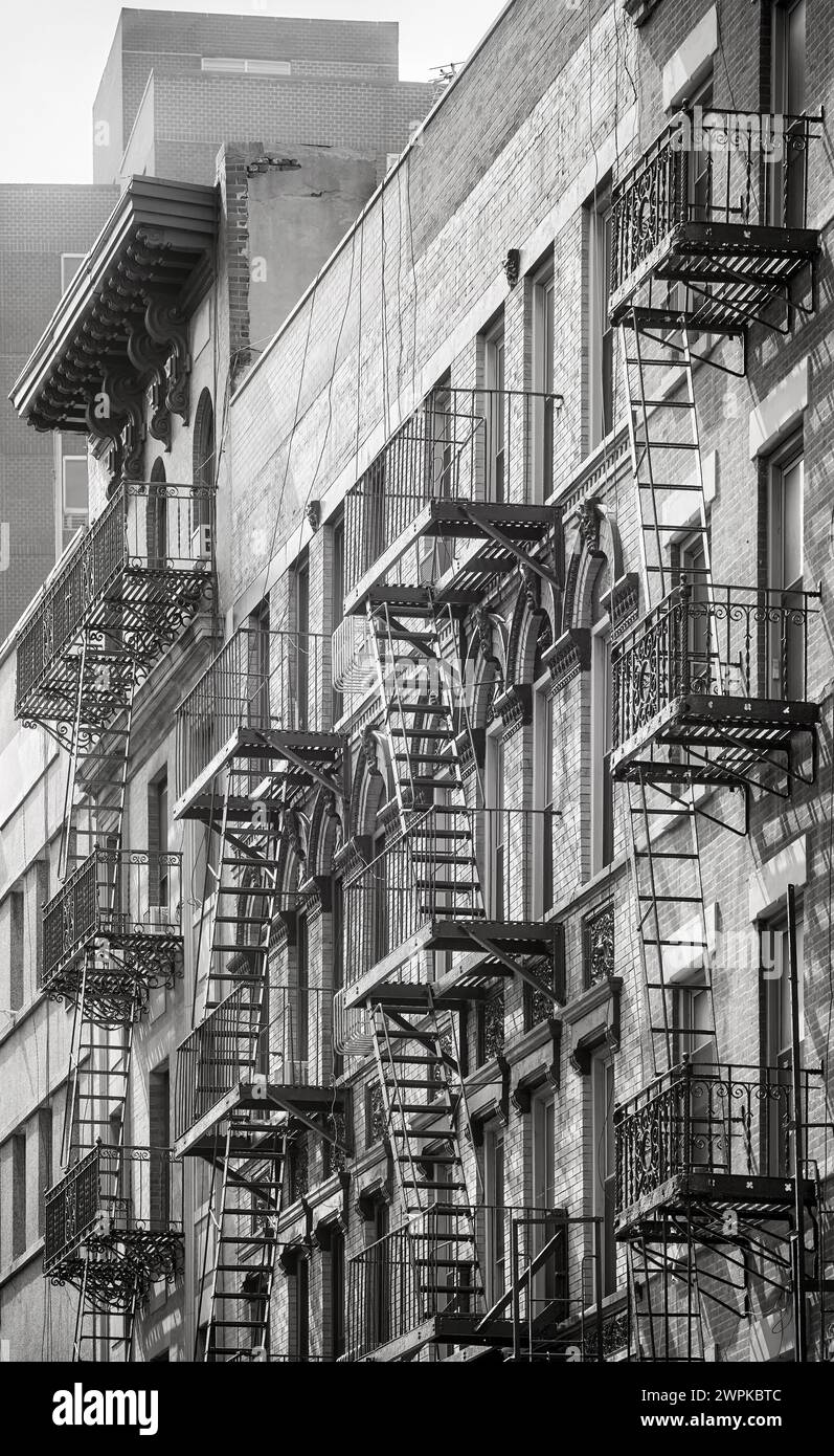 Black and white photo of buildings with fire escapes, New York City ...