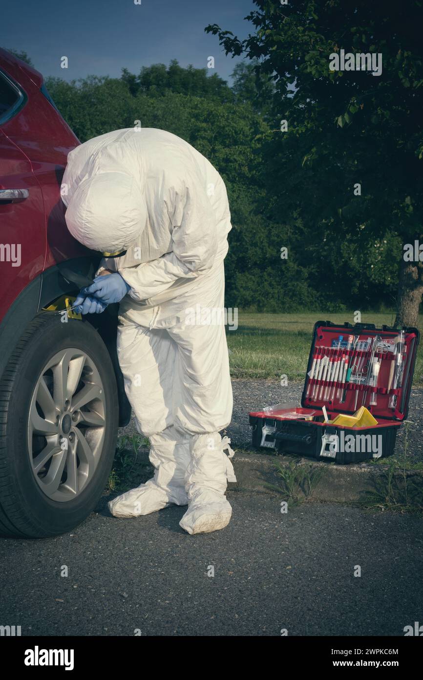 Crime scene investigation collecting of evidences of soil samples on