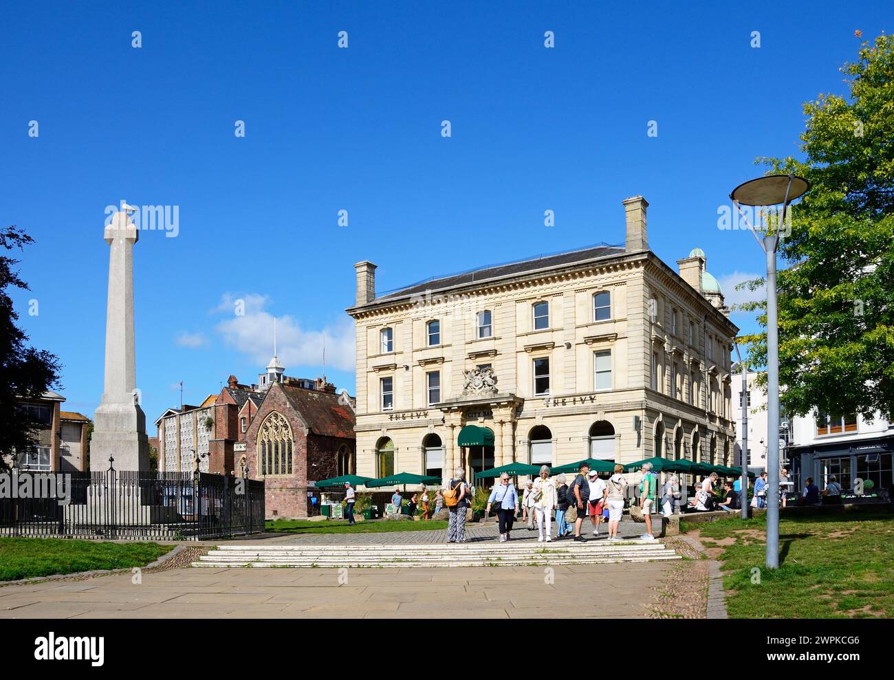 View of The Ivy Bistro and St Pentrock church along Cathedral Yard in the city centre, Exeter, Devon, UK, Europe. Stock Photo