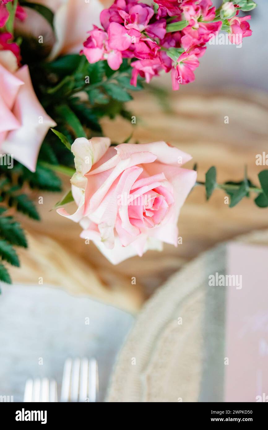 pink flowers on a table easter brunch Stock Photo
