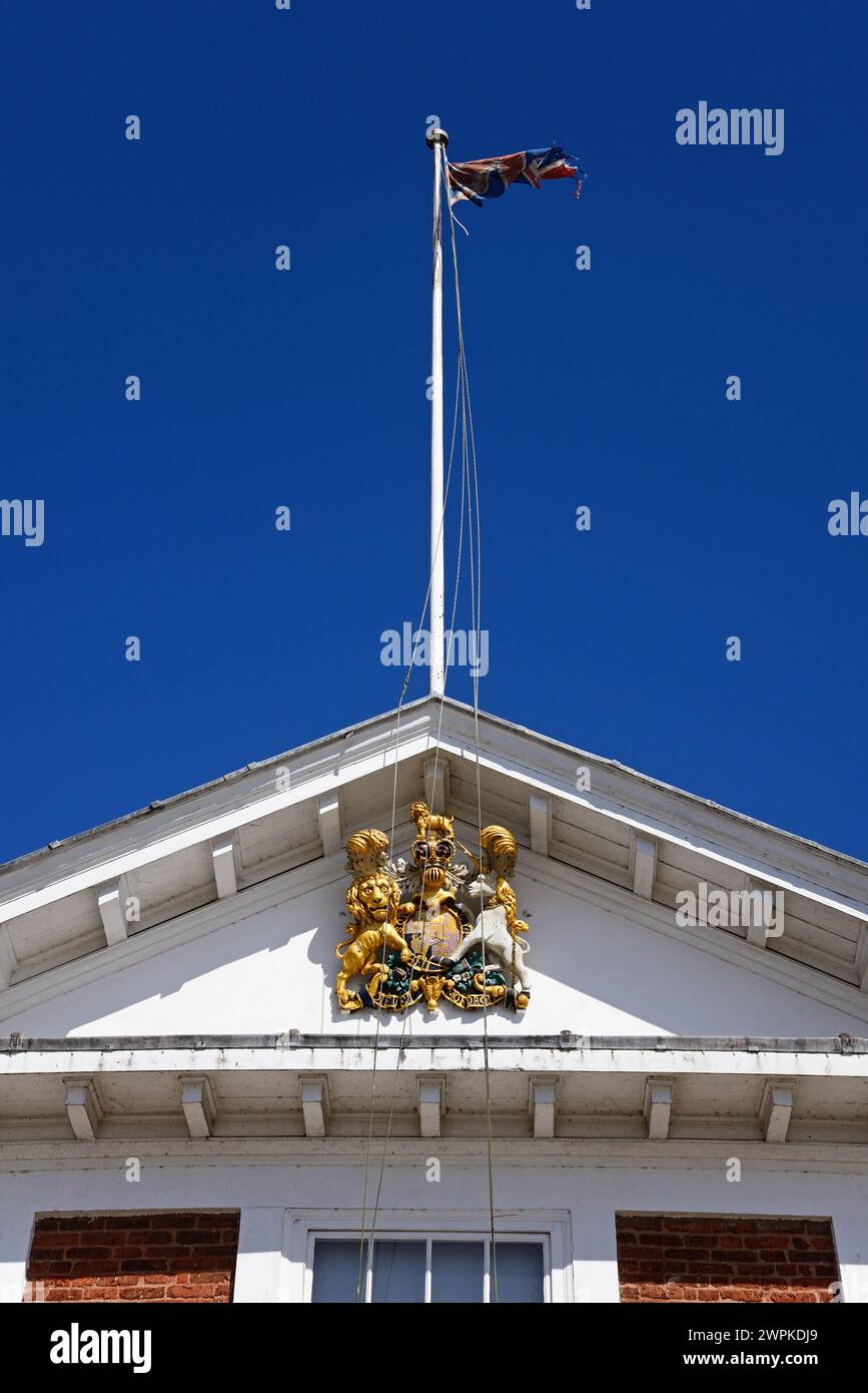 The Royal coast of arms on the front of the Custom House (now a visitor centre) along the waterfront, Exeter, Devon, UK, Europe. Stock Photo