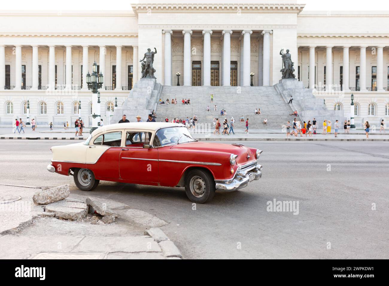 Vintage red car with Havana Capitol in the backdrop Stock Photo