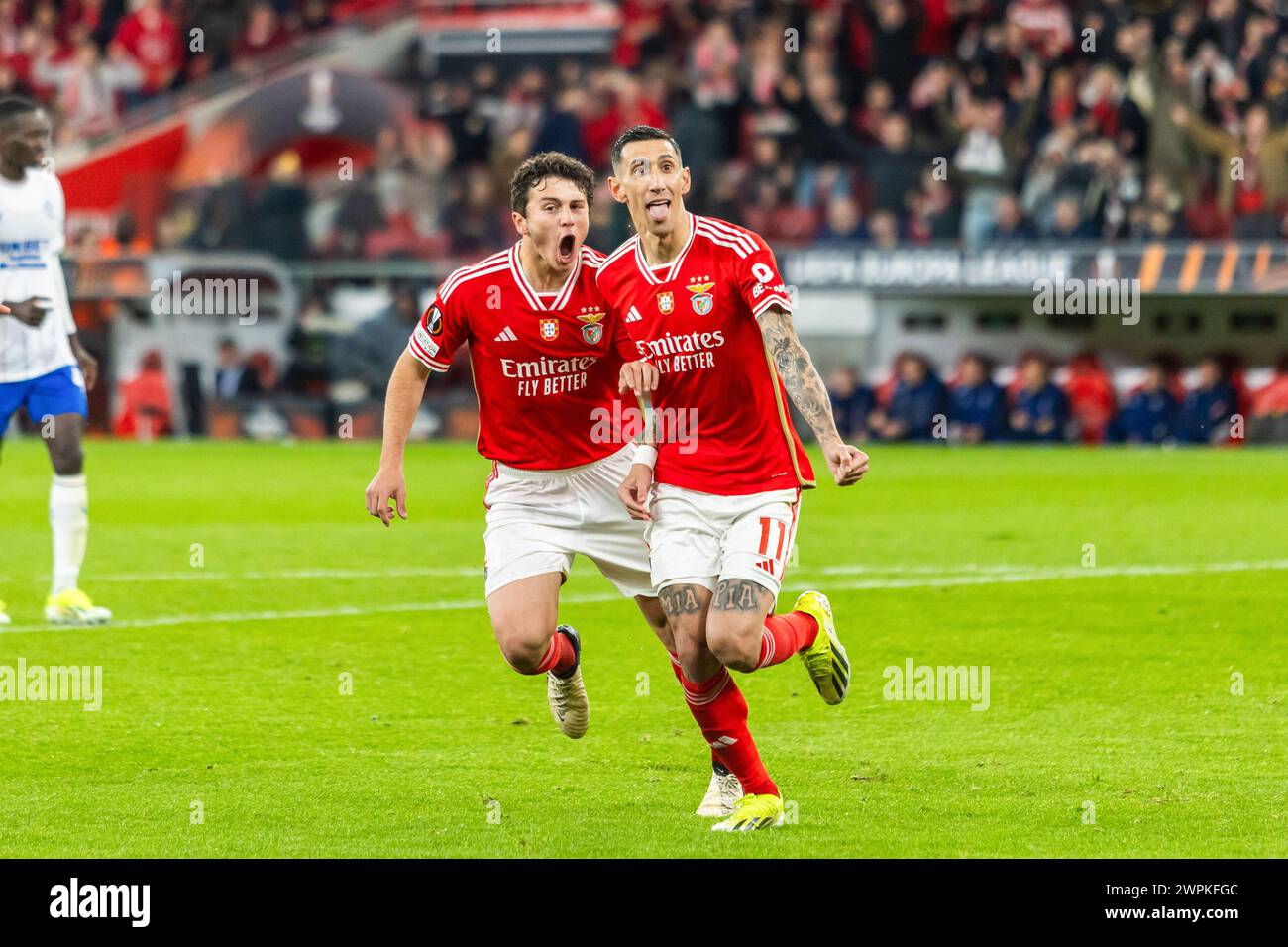 Lisbon, Portugal. 07th Mar, 2024. Joao Neves (L) and Angel Di Maria (R) of SL Benfica seen in action during the UEFA Europa League 2023/24 match between Benfica and Raners at Estadio do Sport Lisboa e Benfica. Final score; Benfica 2 - 2 Rangers. (Photo by Nuno Branco/SOPA Images/Sipa USA) Credit: Sipa USA/Alamy Live News Stock Photo