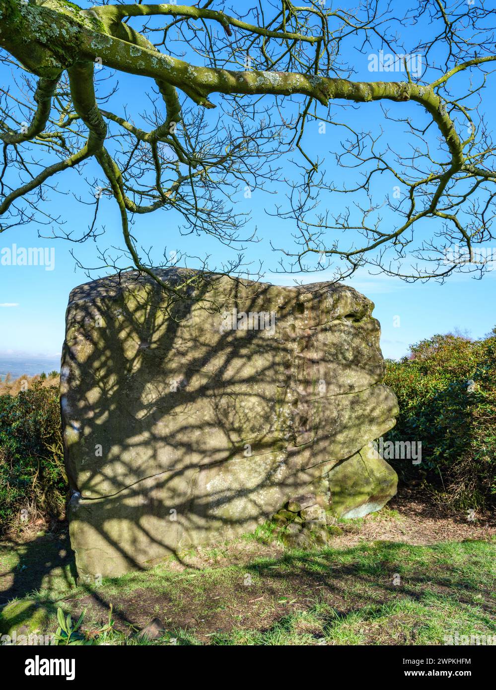 The Andle Stone an isolated gritstone pinnacle on the edge of Stanton Moor overlooking Birchover in the Derbyshire Peak District UK Stock Photo