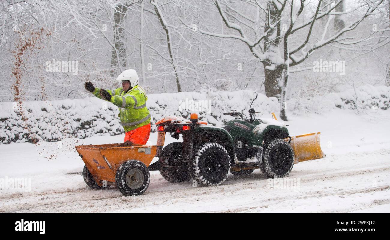 29/01/15  A quad bike is used to grit the A515.  Heavy snowfall results in multiple accidents, stranded vehicles and traffic chaos as the wintery weat Stock Photo