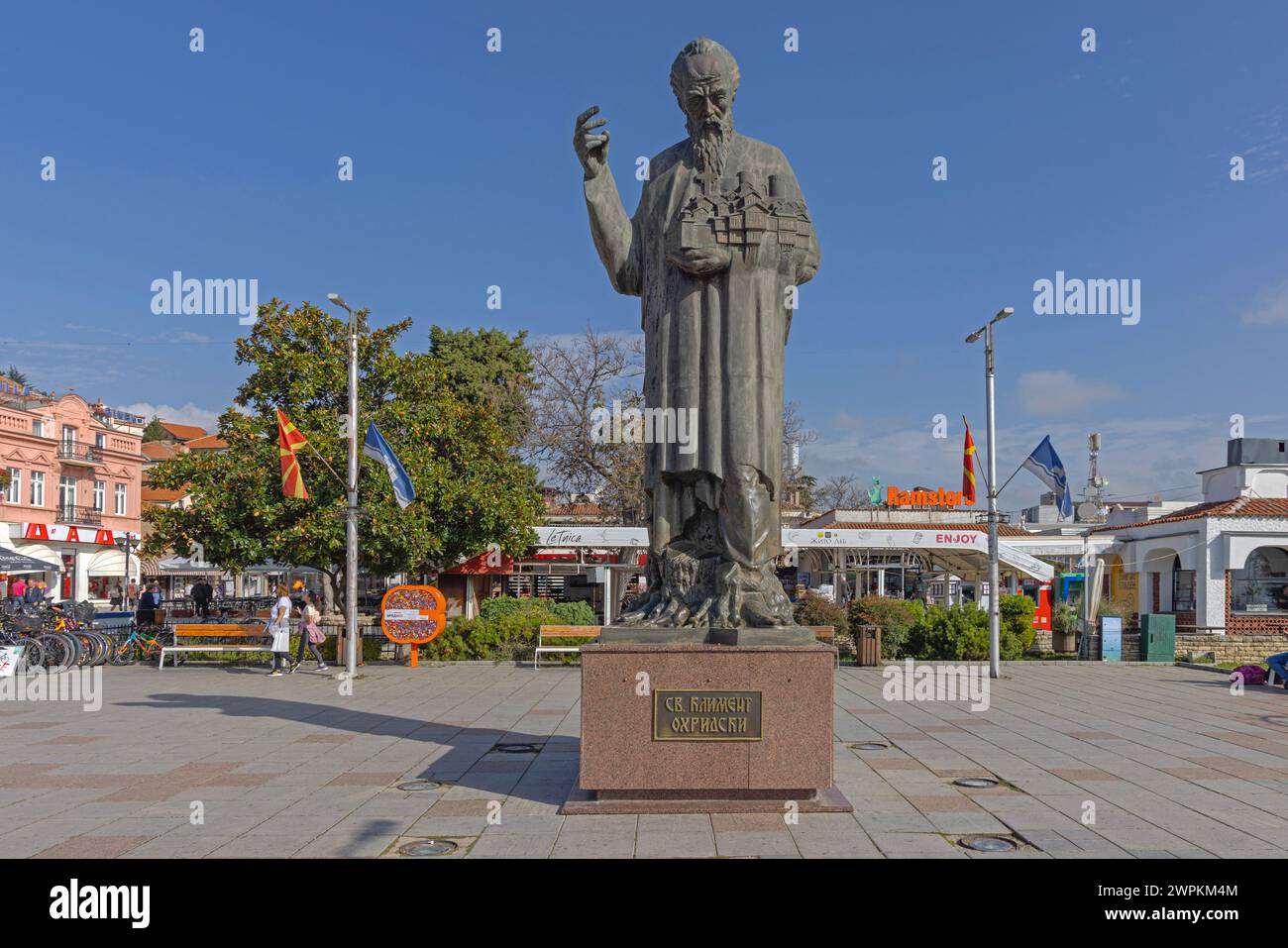 Ohrid, North Macedonia - October 23, 2023: Bronze Statue of Saint Clement of Ohrid Monument Historic Landmark in Town Park at Sunny Autumn Day. Stock Photo