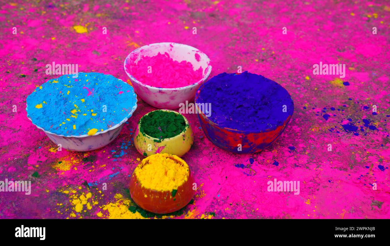 Children covered in colored powder during the festival of Holi. Happy ...