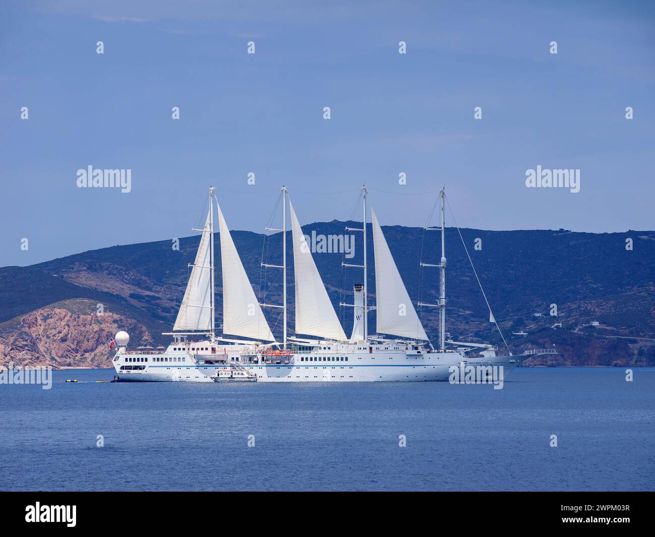 Wind Star four-masted motor sailing Yacht off the coast of Patmos Island, Dodecanese, Greek Islands, Greece, Europe Stock Photo