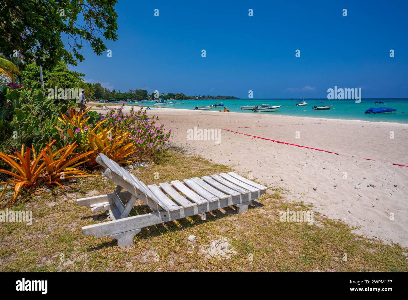 View of Beach at Trou-aux-Biches and turquoise Indian Ocean on sunny day, Trou-aux-Biches, Mauritius, Indian Ocean, Africa Stock Photo