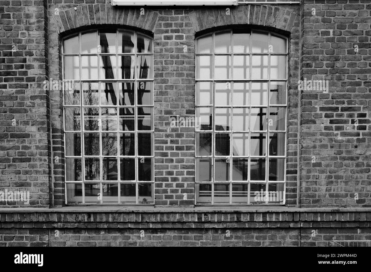 old window in a brick wall of an industrial old buiding Stock Photo - Alamy