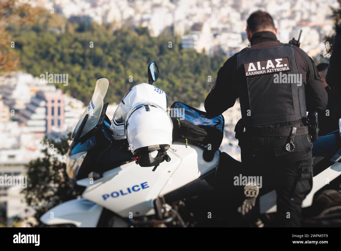 Hellenic Police, Greek police squad on duty riding bike and motorcycle ...