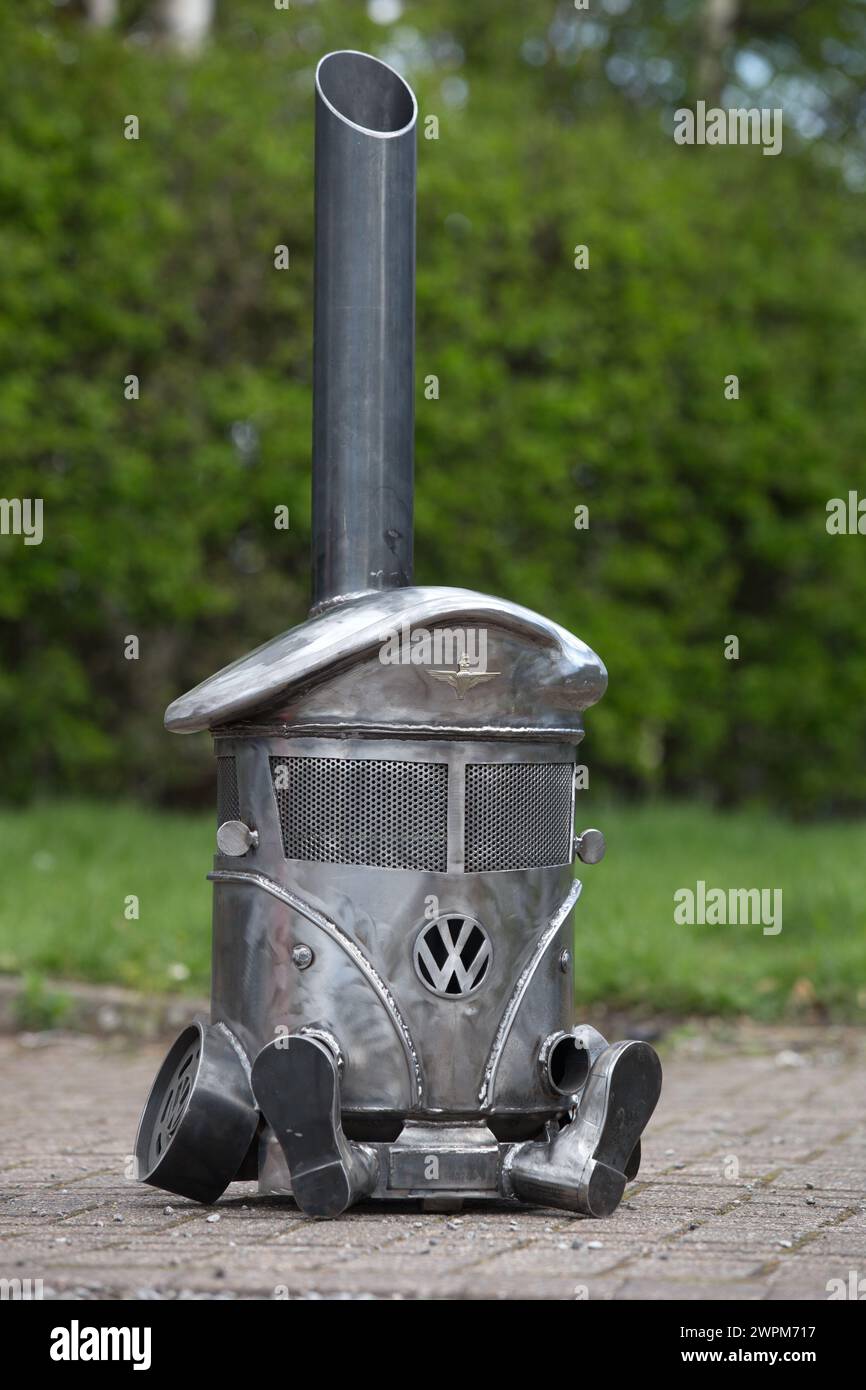 14/04/16  VW camper made for a serving member of the parachute regiment complete with boots and cap badge.  Could these custom-made log burners be thi Stock Photo