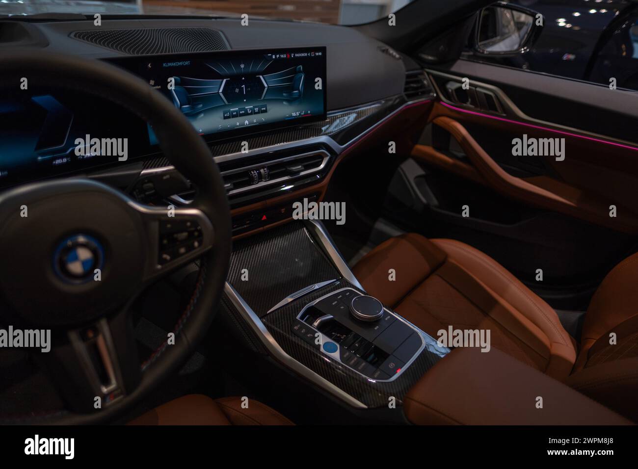 digital gauge cluster, steering wheel, center console BMW i4 electric