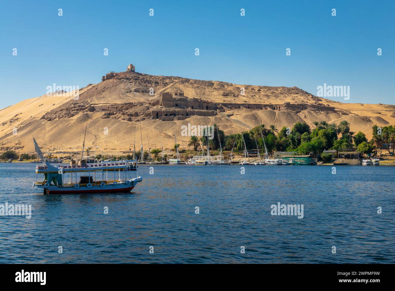 Dome of Abu Al-Hawa (Qubbet el-Hawa) or Dome of the Wind and the Nile river in Aswan, Egypt Stock Photo