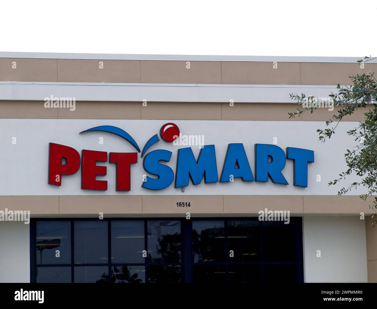 Miami, Florida, United States - February 24, 2024: Pet Smart logo at the entrance of a store. Stock Photo