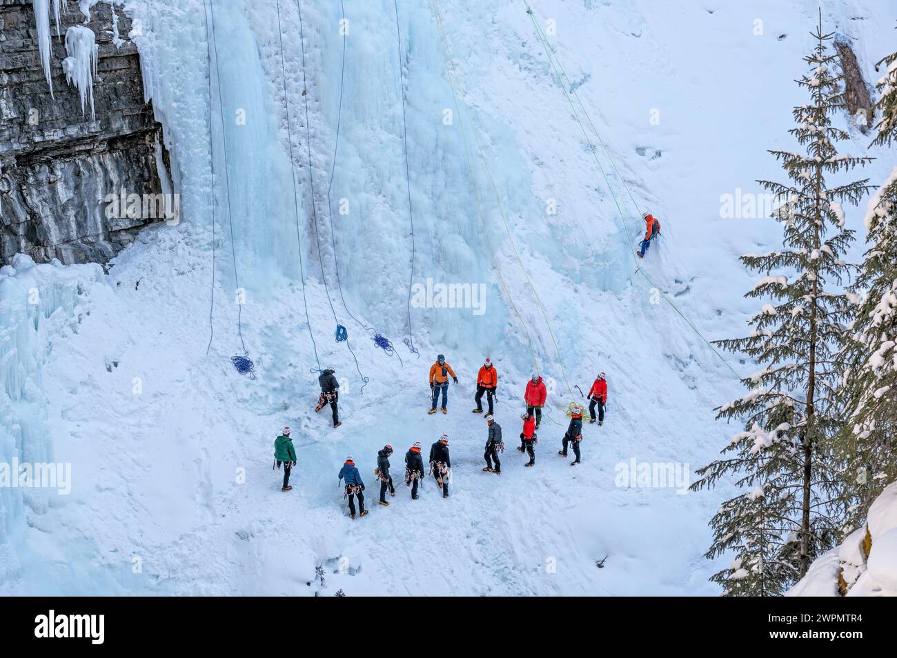 Banff National Park, Alberta, Canada – March 07, 2024:  A group of people in Johnston Canyon prepare for an ice climb Stock Photo