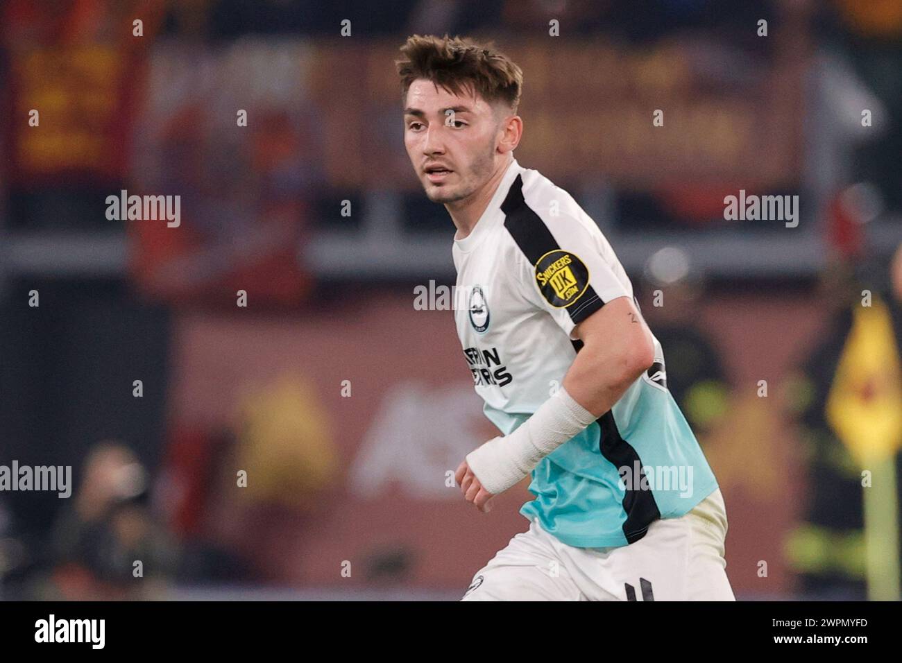 Billy Gilmour of Brighton  of Brighton  controls the ball  during Uefa Europa League round of 16 first leg match AS Roma -  Brighton & Hove Albion at  Stadio Olimpico  on March 7, 2024 in Rome , Italy. Stock Photo