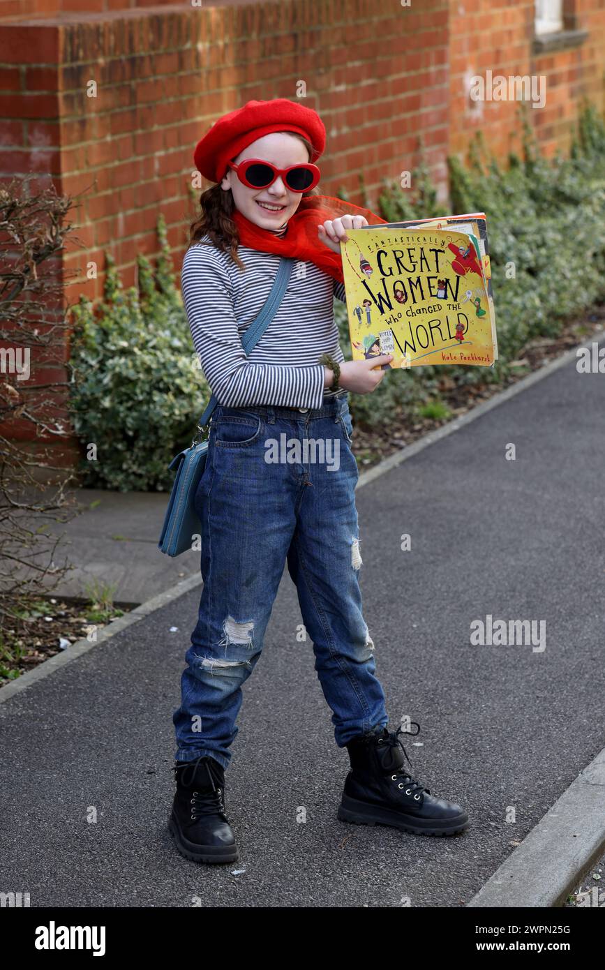 A young girl dressed up as Agent Fifi for World Book Day in West Sussex, UK. Stock Photo
