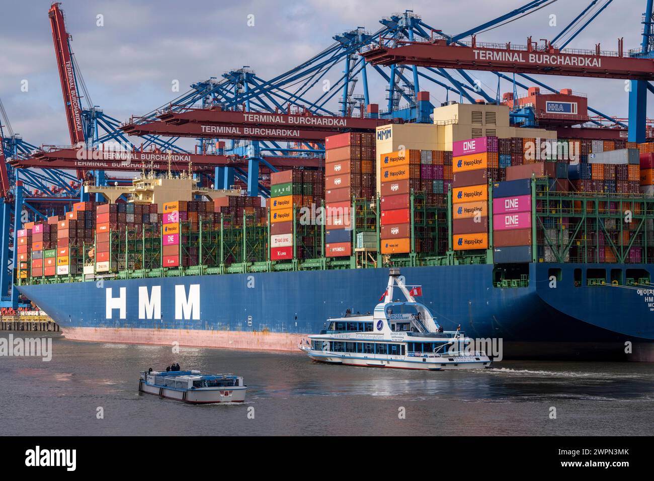 Port tour in Waltershofer Hafen, HHLA Container Terminal Burchardkai, HMM Nuri container freighter, container ship, Hamburg, Germany Stock Photo