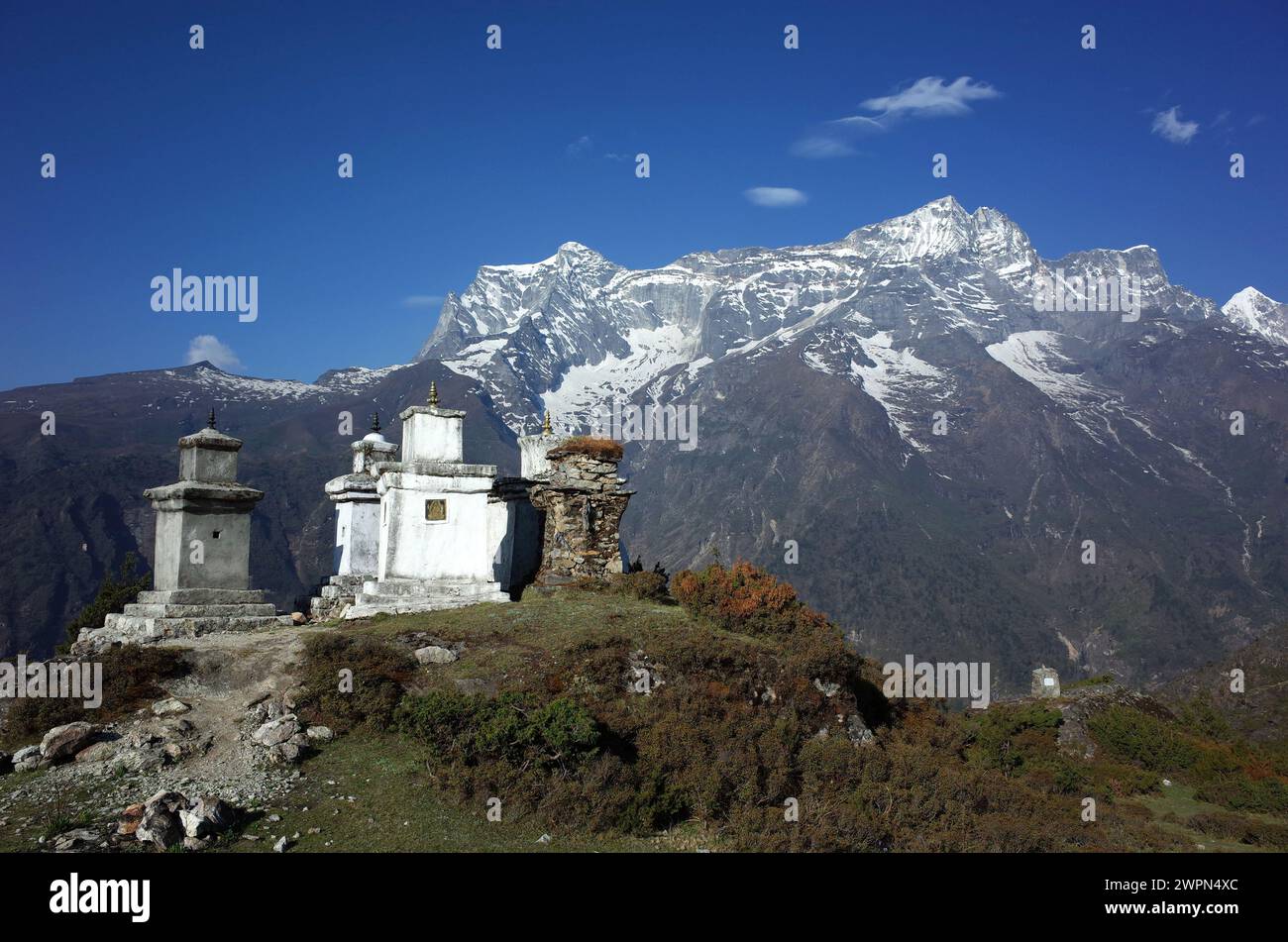 Buddhist stupas in Himalaya mountains with view of Kongde mount ...