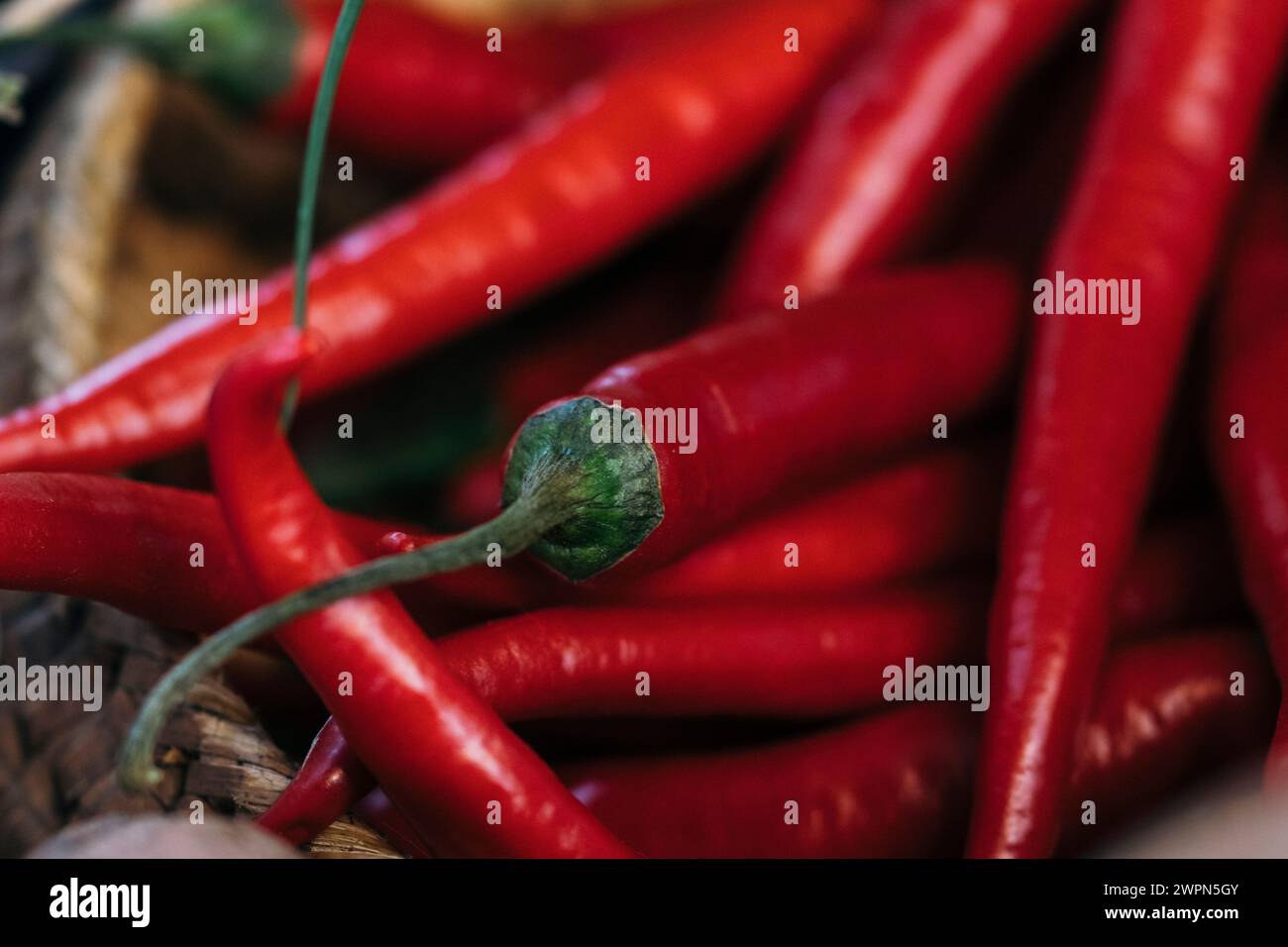 Chili peppers at the market stall Stock Photo - Alamy