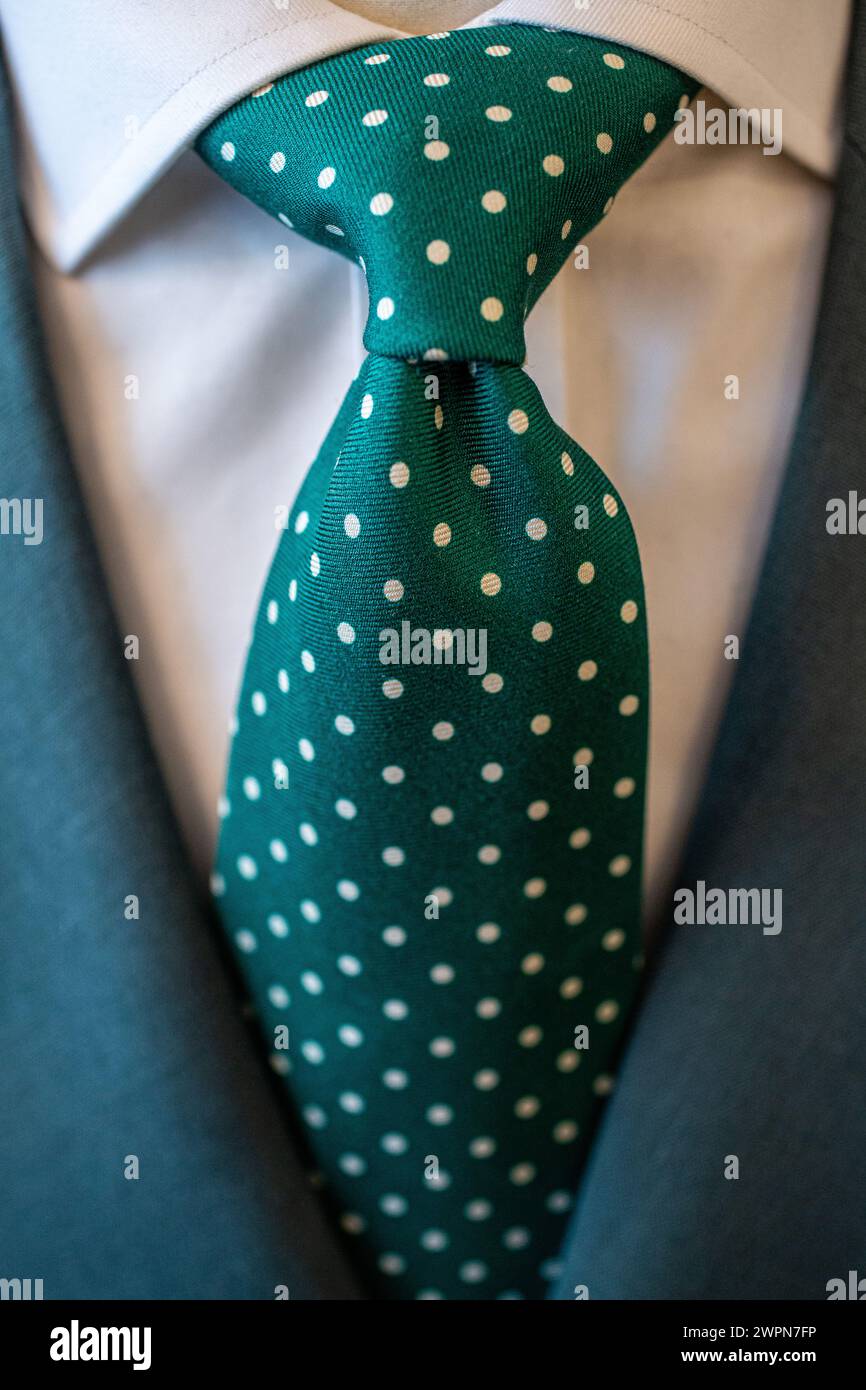 Men's classic polka dot green silk tie Stock Photo