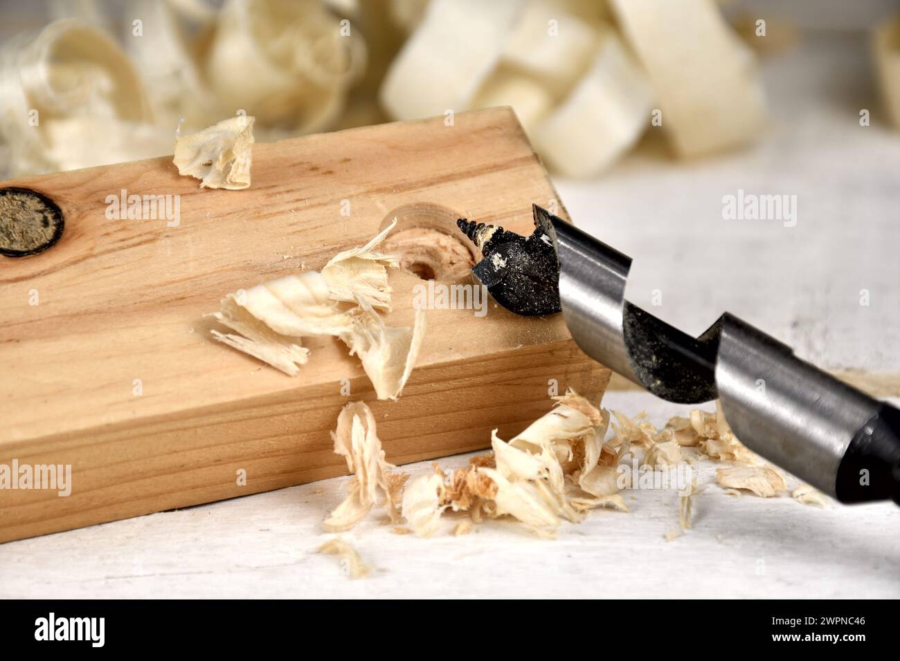 Single flute auger bit hole Stock Photo Alamy
