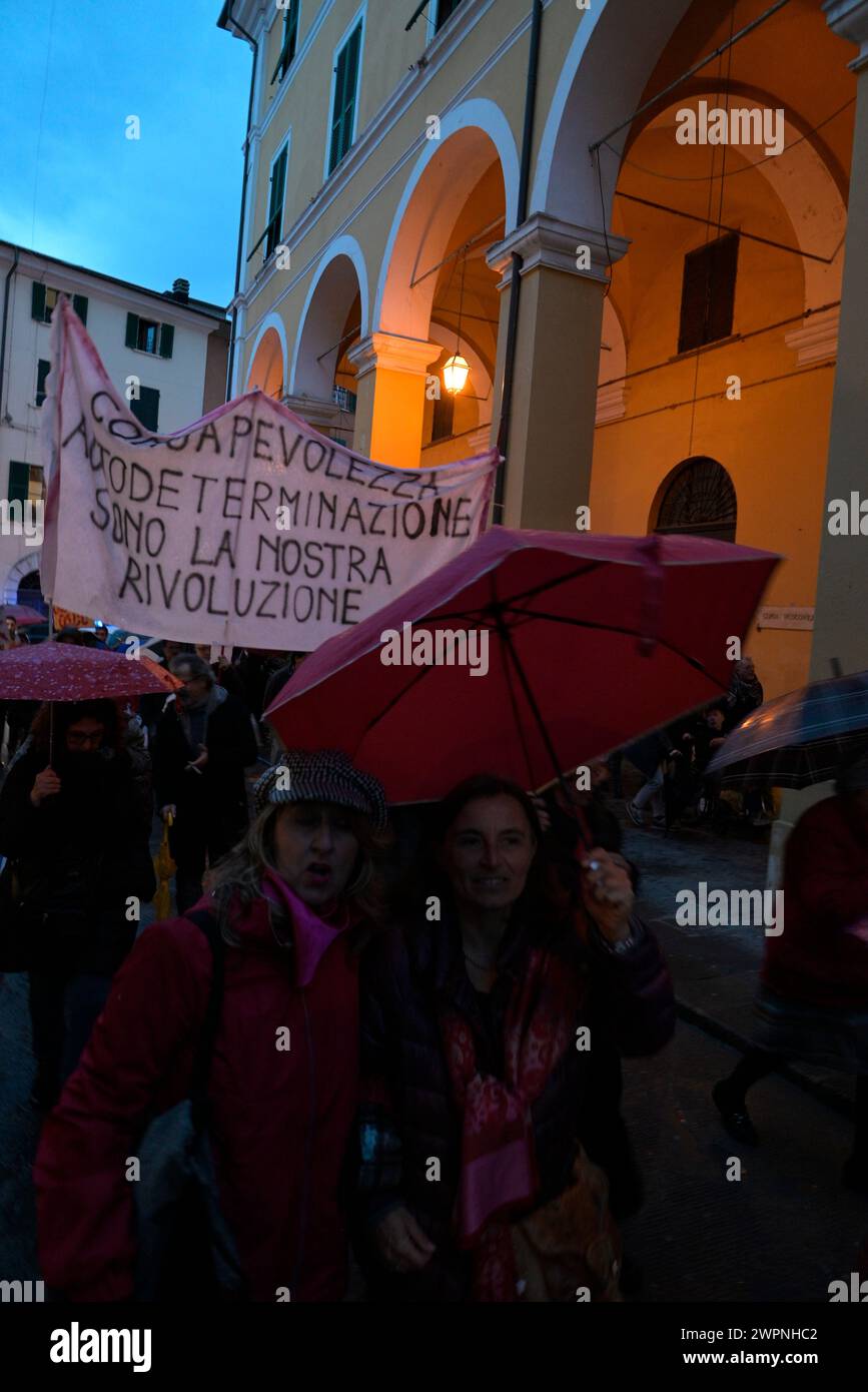 Massa, Massa-Carrara, Tuscany, Italy, 8th March, 2024. A demonstration in the streets of the city. Eight points for the Eighth of March. General Strike Against Patriarchal Violence by Non una di meno Massa Carrara, the feminist collective, intersectional and eco-feminist space that distances itself from serial haters and condemns all forms of violence, including verbal violence. On 8th March, strike against patriarchal violence in all its forms! Credit: Paolo Maggiani/Alamy Live News Stock Photo