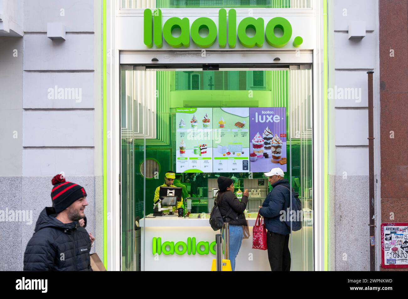 Customers are seen at the Spanish frozen yogurt franchise brand