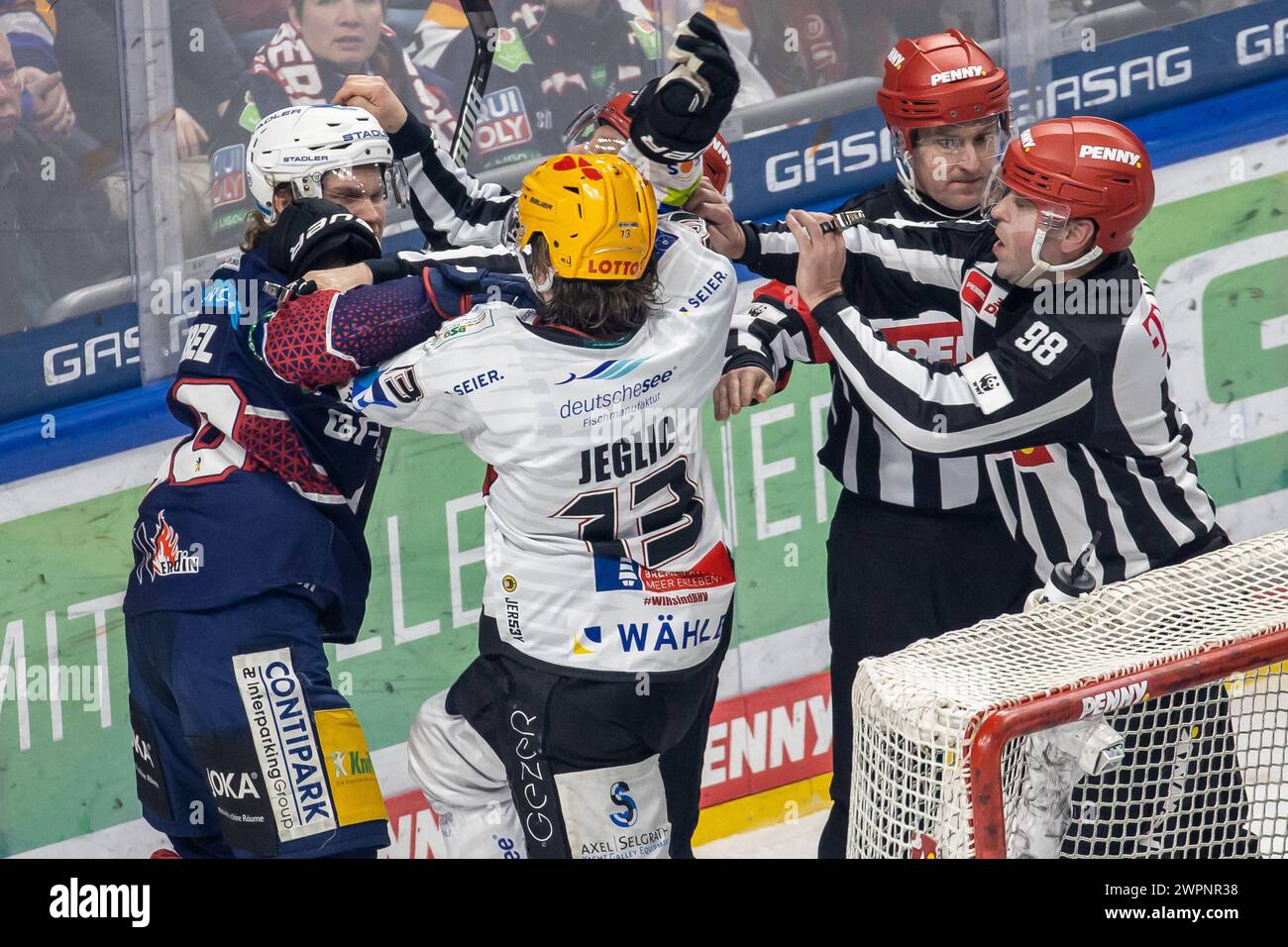 Berlin, Germany. 08th Mar, 2024. Ice hockey: DEL, Eisbären Berlin - Pinguins Bremerhaven, Main Round, Matchday 52, Mercedes-Benz Arena. Berlin's Korbinian Geibel (l) in a scuffle against Ziga Jeglic of Pinguins Bremerhaven. Credit: Andreas Gora/dpa/Alamy Live News Stock Photo