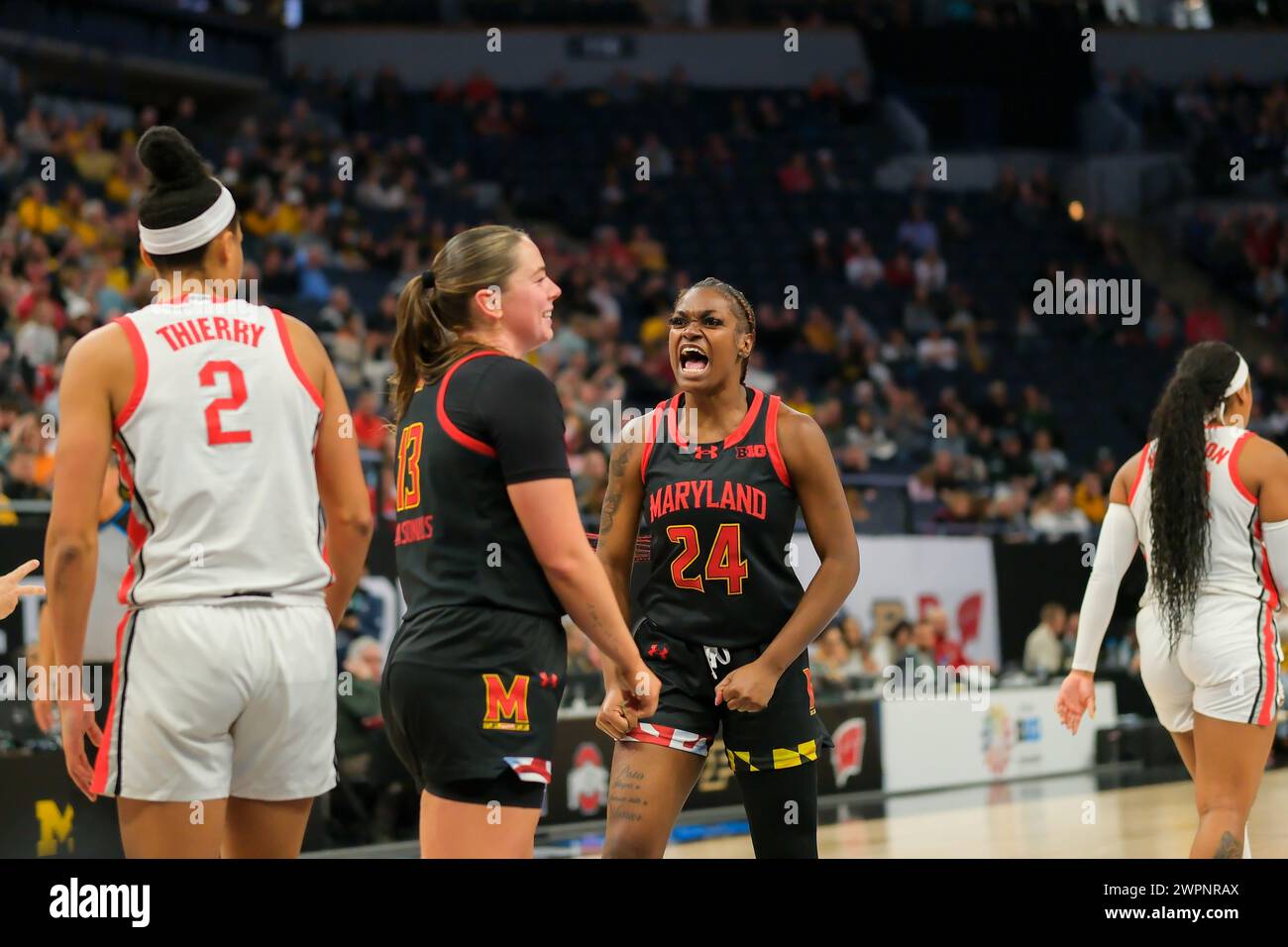 Minneapolis, Minnesota, USA. 8th Mar, 2024. Maryland Terrapins guard BRI MCDANIEL (24) reacts during a quarterfinal game between Ohio State and Maryland at the 2024 TIAA Big10 Women's Basketball Tournament at Target Center on March 8th, 2024. Maryland won 82-61. (Credit Image: © Steven Garcia/ZUMA Press Wire) EDITORIAL USAGE ONLY! Not for Commercial USAGE! Stock Photo